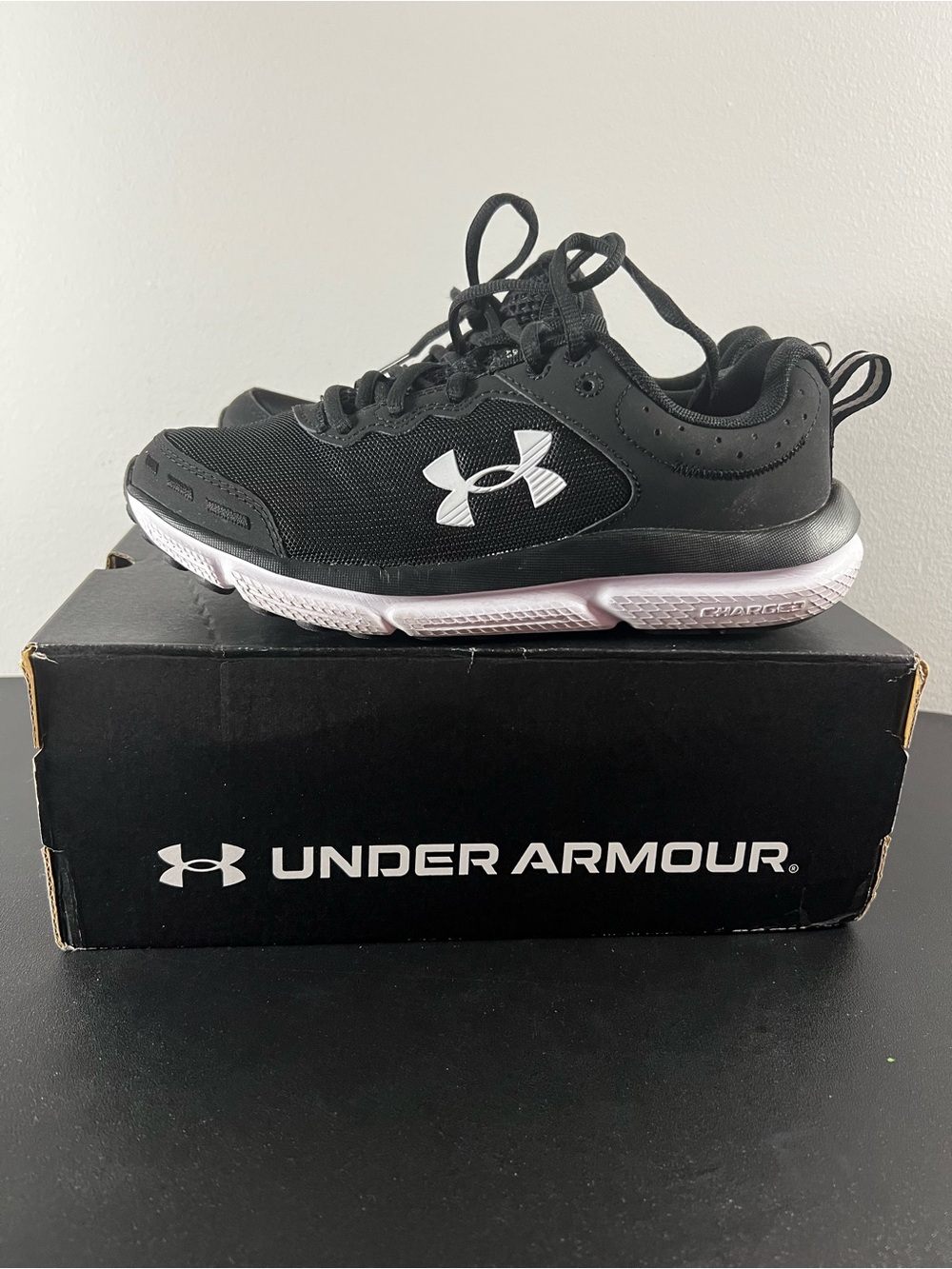 Under Armour Kids Black Sneakers with White Logo and Light Pink Midsole